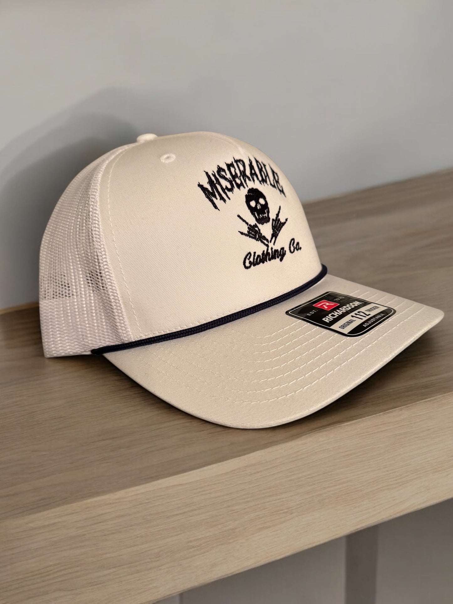 Miserable Curved Trucker Hat